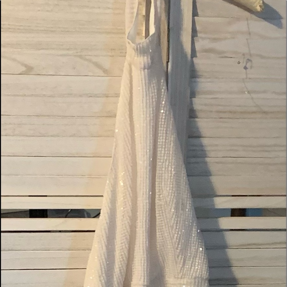 Nakita Clarke White sequin material